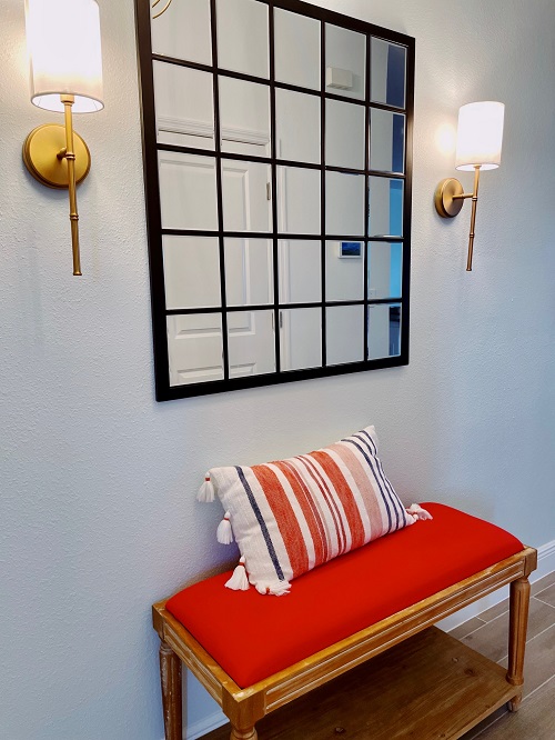 Pair of coastal sconces, mirror and coral bench