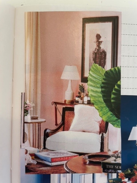 Magazine clipping of a pink room with cane back chair